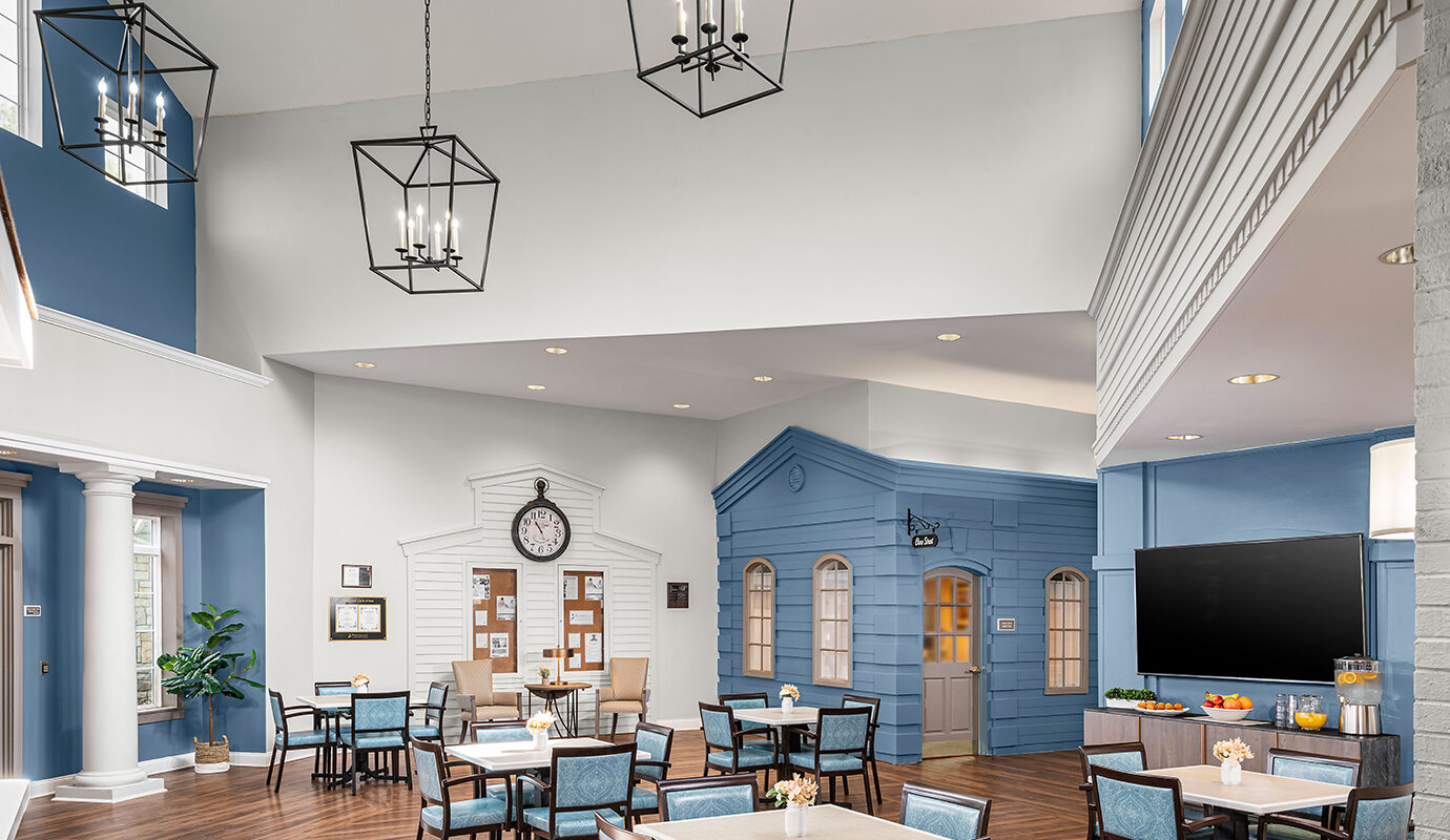 Cute decorated dining area with large tv