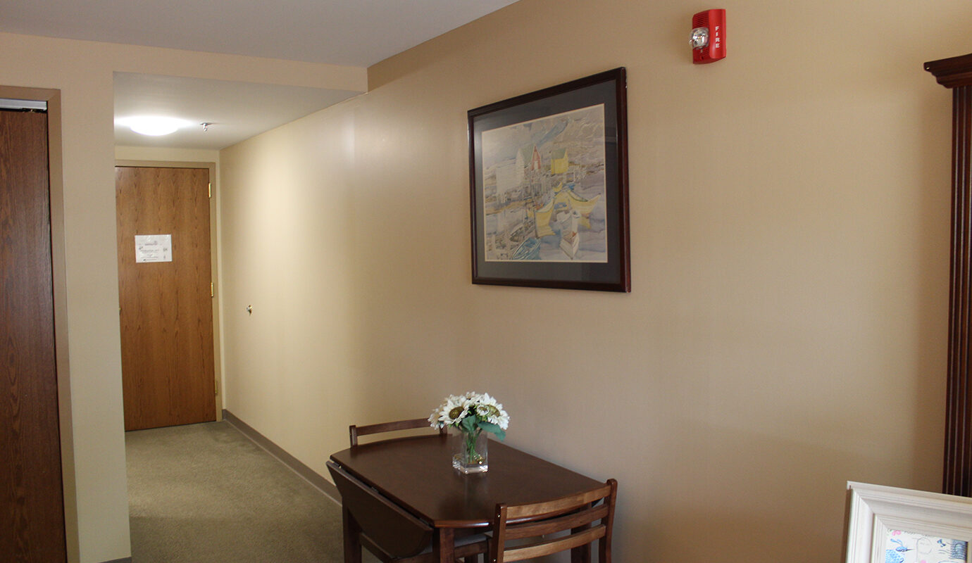 Small dining table in resident room