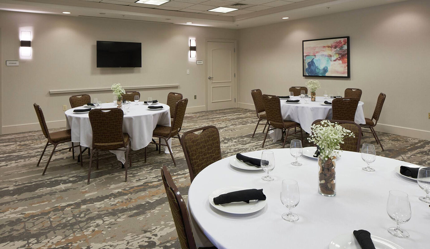 Dining room with linens and dining ware