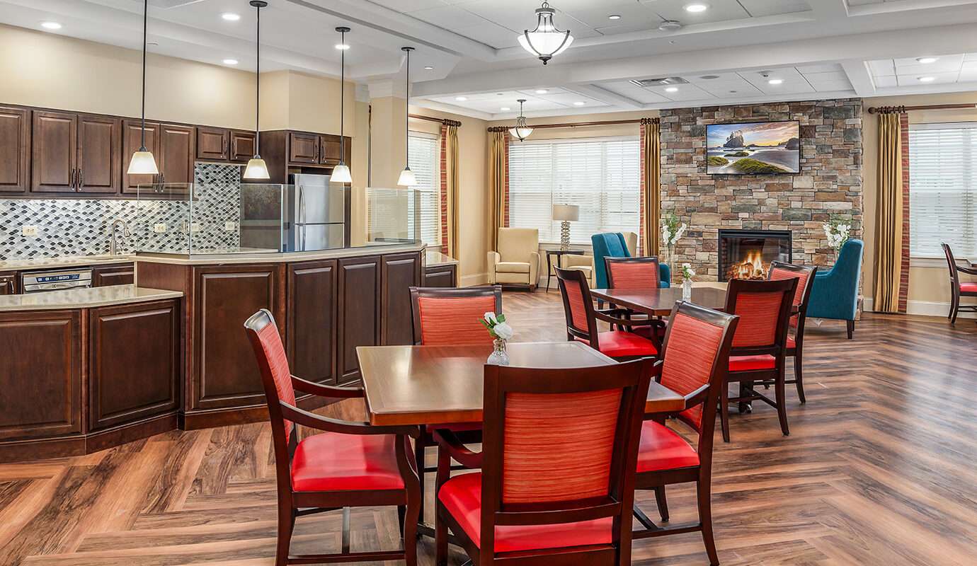 Dining room near kitchen with TV and fireplace nearby