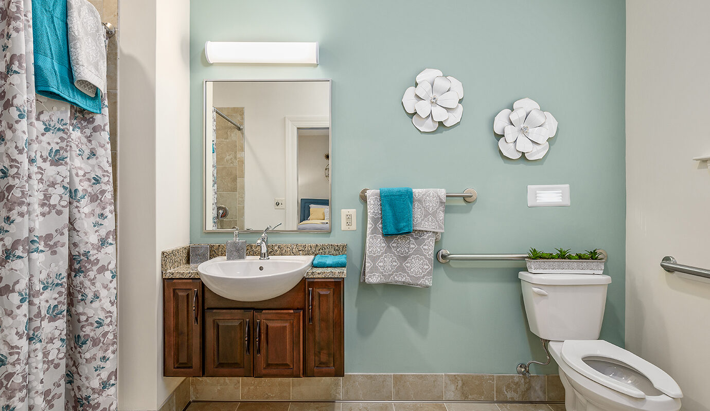 Decorated bathroom with shower