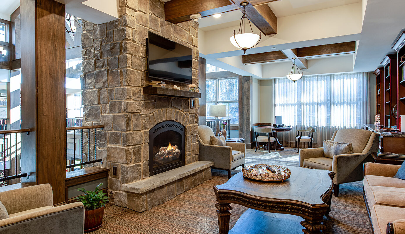 Large stone fireplace in common area