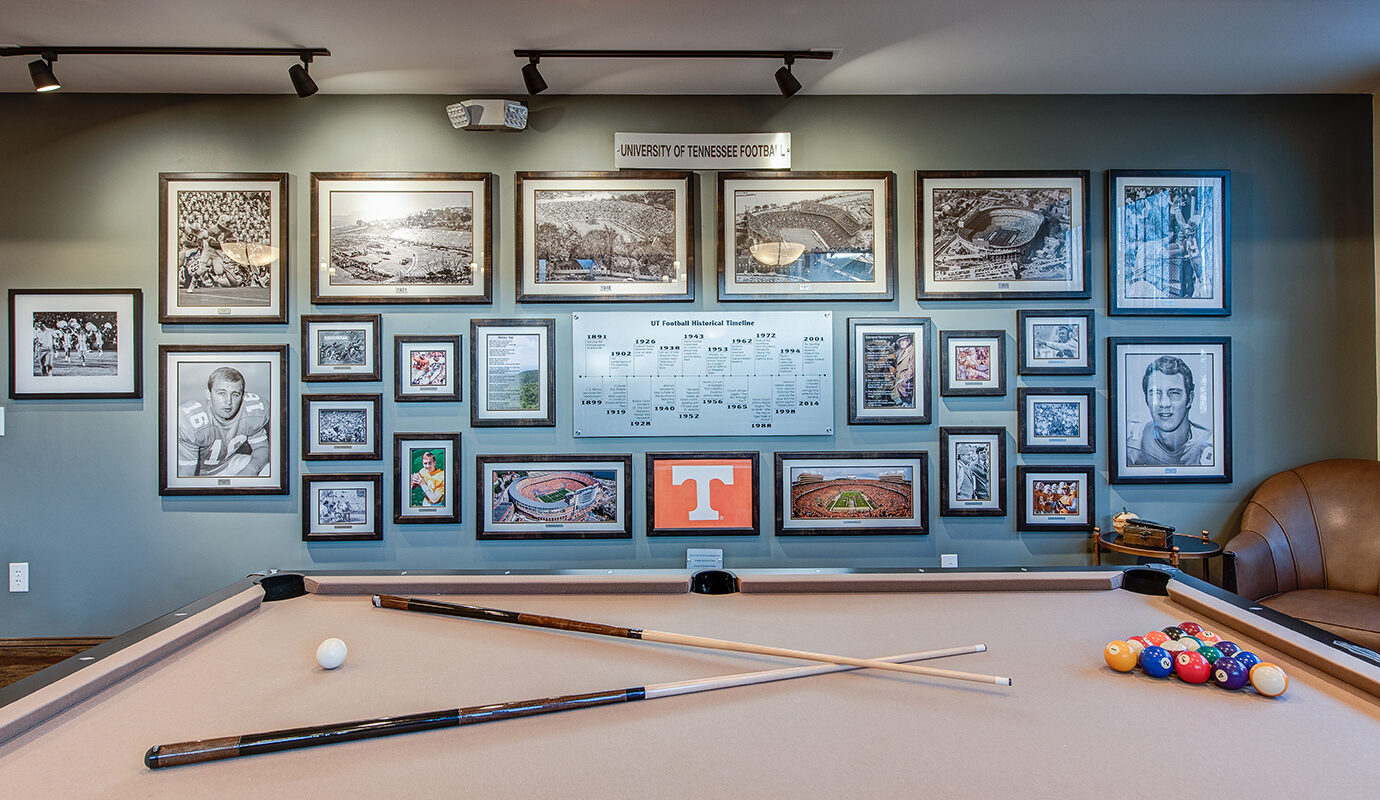 Pool table with University of TN football photos