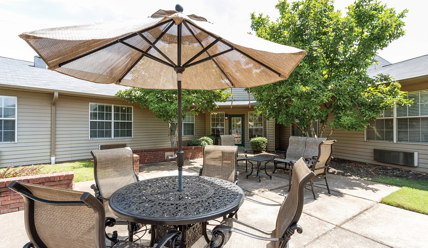 Outdoor patio area with umbrella seating